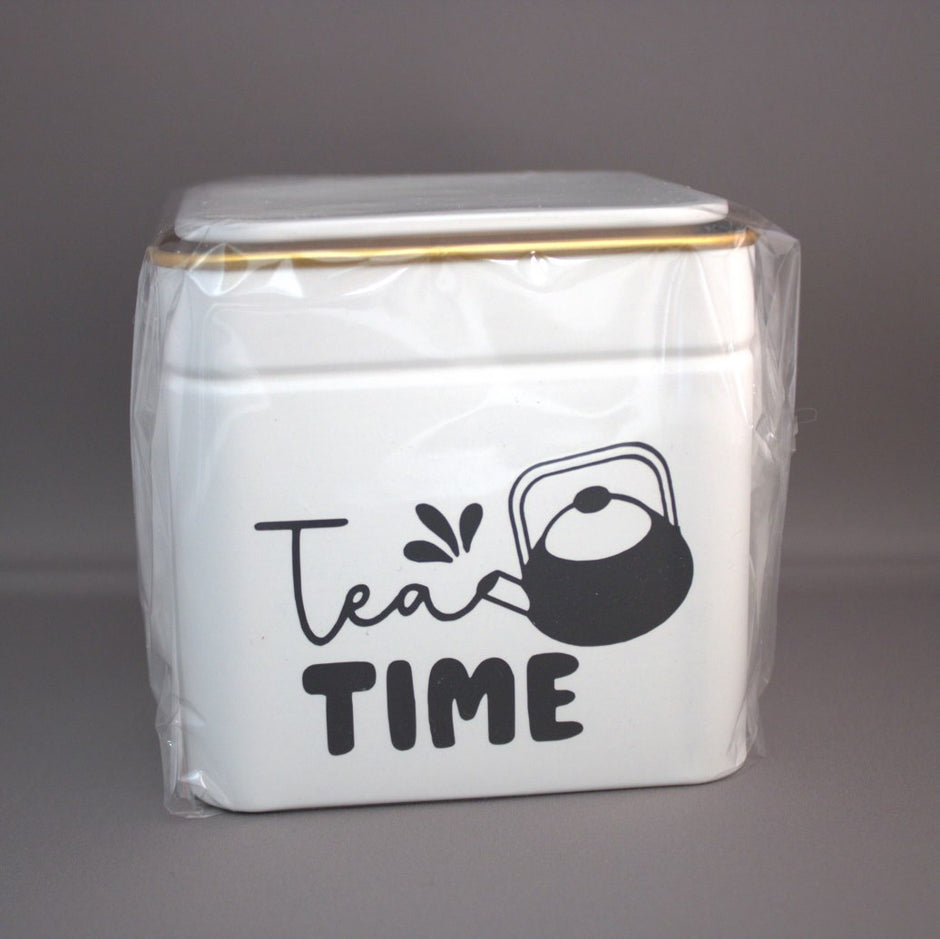 Thee bewaarblik met tekst Tea Is a Hug in a Mug - sfeervol theecadeau voor theeliefhebber